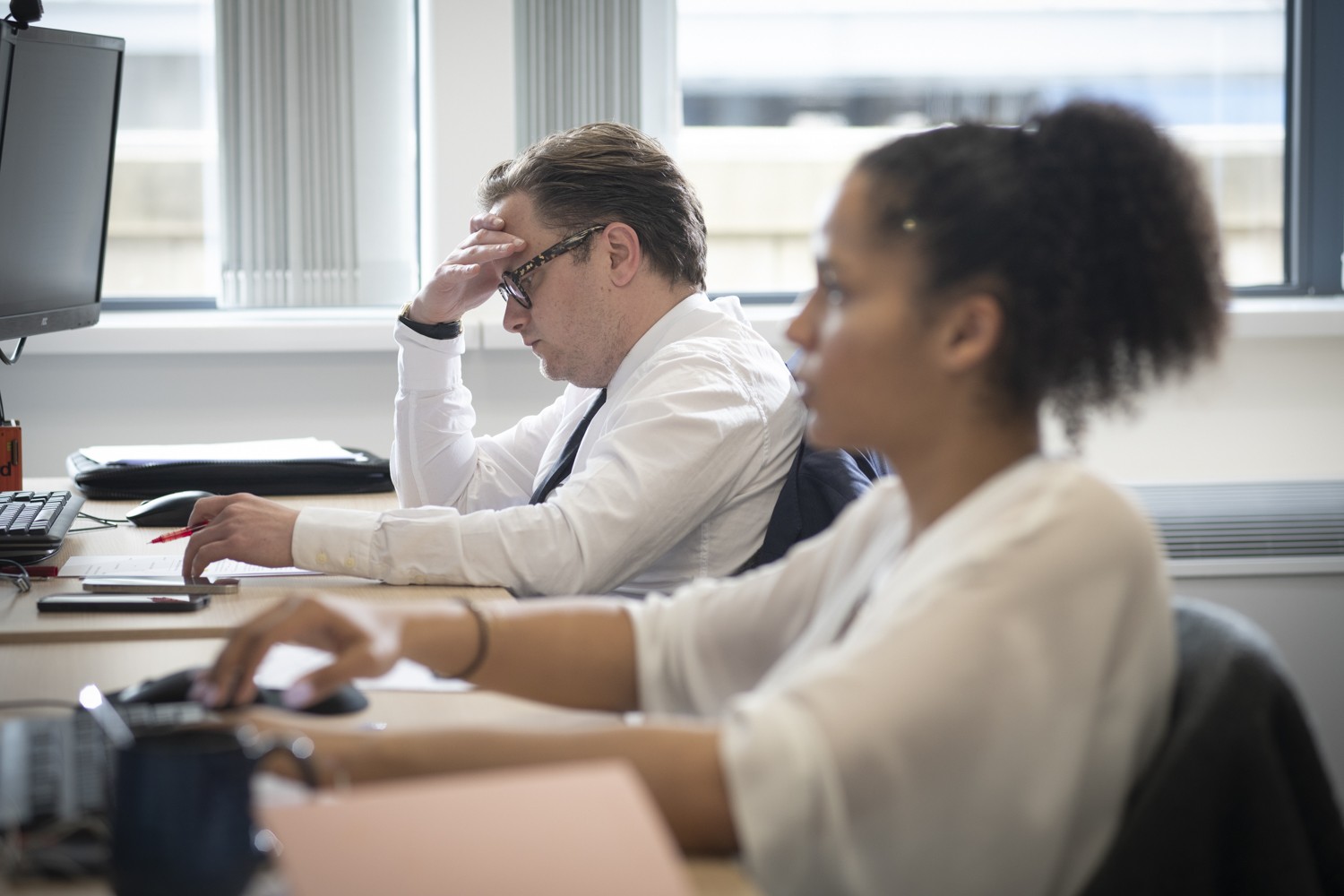 staff in library with books
