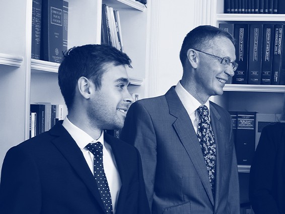 Two team members standing